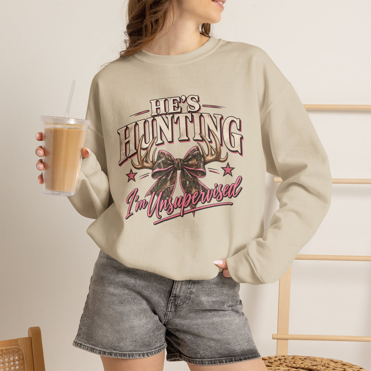 He’s Hunting, I’m Unsupervised Camo Bow Crewneck